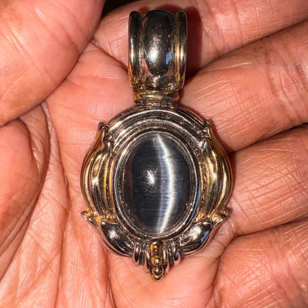 Oval Gray Cat's Eye Pendant Set in Metallic Gold and Silver